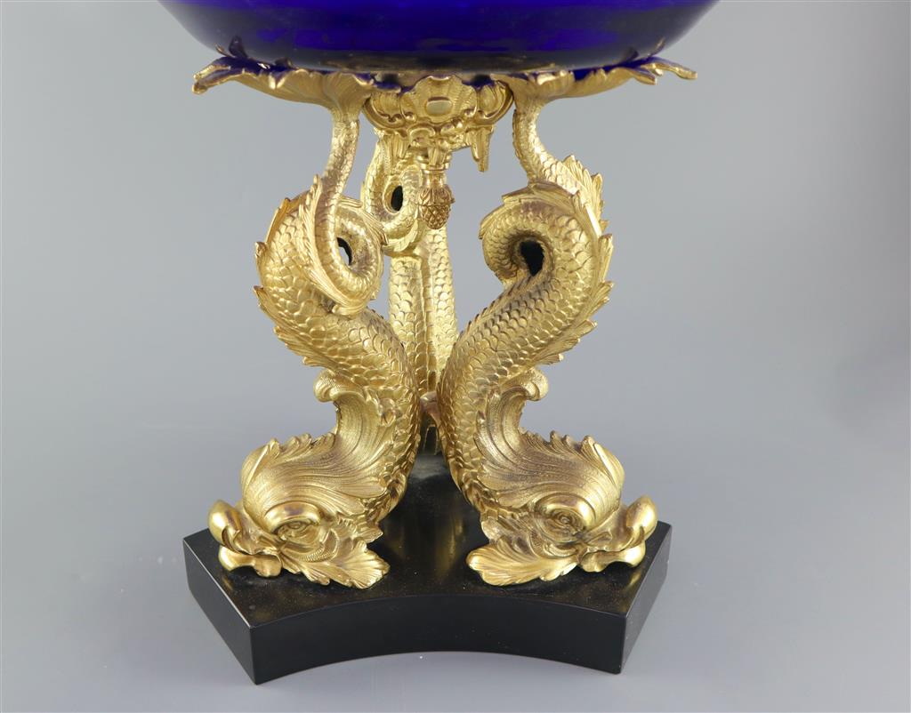 An impressive Regency blue glass and ormolu dolphin centrepiece fruit bowl, 39.5cm diameter